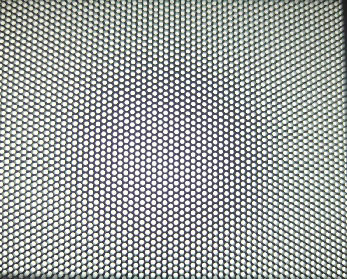 Magnetic dust filter covering ventilation panel on Cooler Master NR200 case