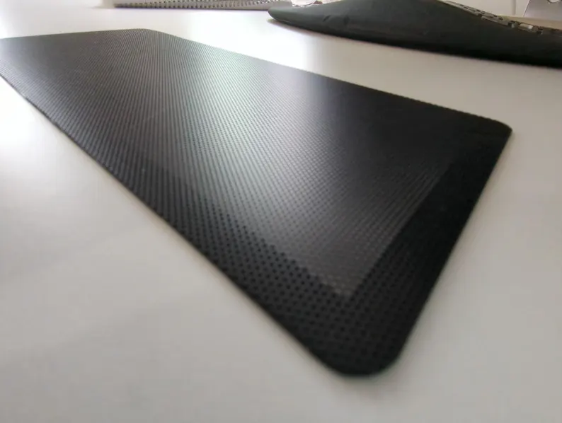 Magnetic dust filter covering ventilation panel on Cooler Master NR200 case