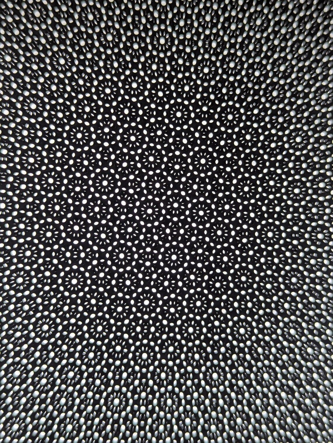 Magnetic dust filter covering ventilation panel on Cooler Master NR200 case
